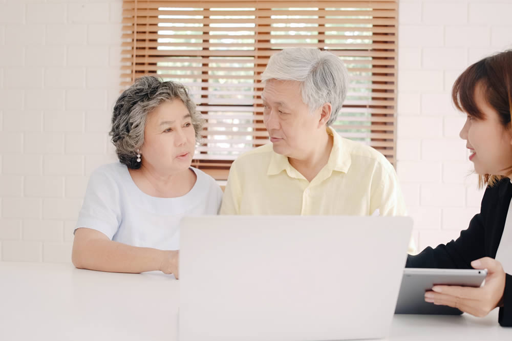 Photo of Couple and Computer